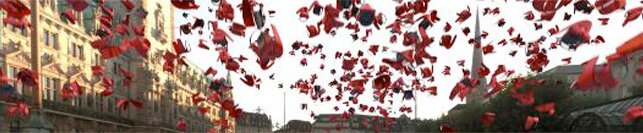 Chairs falling from the sky in a city street